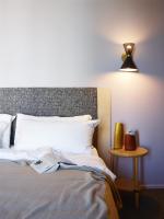 Ein Bett oder Betten in einem Zimmer der Unterkunft Alex Hotel