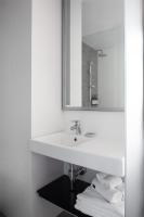 Ein Badezimmer in der Unterkunft Alex Hotel