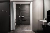 Ein Badezimmer in der Unterkunft Alex Hotel