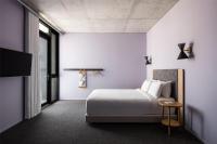 Ein Bett oder Betten in einem Zimmer der Unterkunft Alex Hotel