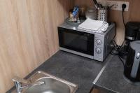 Kuchyňa alebo kuchynka v ubytovaní Lucsony Apartman