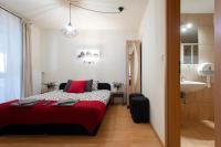Posteľ alebo postele v izbe v ubytovaní Lucsony Apartman