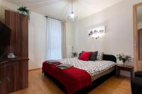 Posteľ alebo postele v izbe v ubytovaní Lucsony Apartman