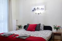 Posteľ alebo postele v izbe v ubytovaní Lucsony Apartman