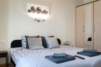 Posteľ alebo postele v izbe v ubytovaní Lucsony Apartman