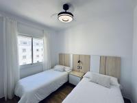 Postel nebo postele na pokoji v ubytování Apartamentos Turísticos Santo Rostro