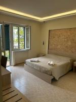 A bed or beds in a room at Vittorio Veneto Accomodation - Tropea city center