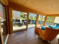 A seating area at Alpenapart Singer - contactless check-in
