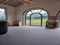 A seating area at Tranquil Cottage Retreat in Todi, Umbria