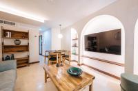 TV a/nebo společenská místnost v ubytování Apartamentos La Vistosona