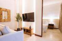 TV a/nebo společenská místnost v ubytování Apartamentos La Vistosona