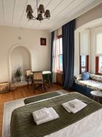 Postel nebo postele na pokoji v ubytování Levant Pension de Luxe