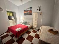Postel nebo postele na pokoji v ubytování Santa Isabel Low Cost Rooms in private house