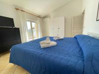 Posteľ alebo postele v izbe v ubytovaní Residence Ponente