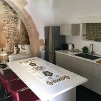 A kitchen or kitchenette at Le Cinque Pietre