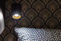 Posteľ alebo postele v izbe v ubytovaní La Suite Sépia - Superbe appartement Vieux Lyon