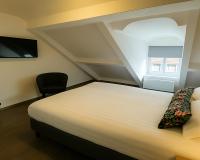 Hotel Hendrickxにあるベッド