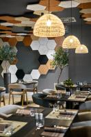 Ein Restaurant oder anderes Speiselokal in der Unterkunft Remisens Hotel LUCIJA 