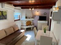Kuchyň nebo kuchyňský kout v ubytování Holiday Home Dorina