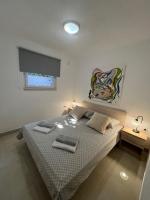 Postel nebo postele na pokoji v ubytování Holiday Home Dorina