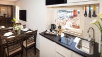 Kuchyň nebo kuchyňský kout v ubytování Apartment Shambala Sea View