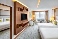 A bed or beds in a room at Kempinski Hotel Corvinus Budapest