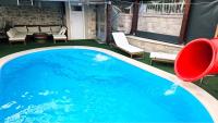 Bazén v ubytování Holiday Home Gustirna nebo v jeho okolí