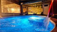Bazén v ubytování Holiday Home Gustirna nebo v jeho okolí