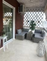 Posedenie v ubytovaní Glyfada golf fourth floor apartment