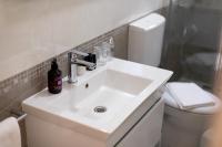 Kúpeľňa v ubytovaní Apartment Pavlović