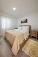 Posteľ alebo postele v izbe v ubytovaní Apartment Pavlović