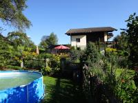 A garden outside Ferienwohnung Anemoon In Millstatt