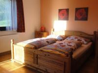 A bed or beds in a room at Ferienwohnung Anemoon In Millstatt