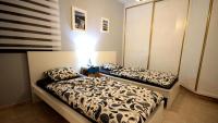 Posteľ alebo postele v izbe v ubytovaní Ferienwohnung Panorama Mit Wasserblick