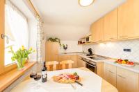 Kuchyň nebo kuchyňský kout v ubytování "Ferienwohnung Anna" - Annehmlichkeiten von 4-Sterne Familien-und Wellnesshotel Viktoria können mitgenutzt werden
