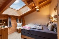 Postel nebo postele na pokoji v ubytování Narzenhof Wellness Chalets, Familien & Luxus Apartments am Bauernhof