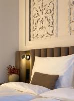 Damas Suites Budapestにあるベッド
