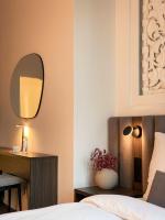 Damas Suites Budapestにあるベッド