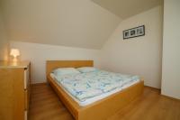 Posteľ alebo postele v izbe v ubytovaní Apartmánový Dom River