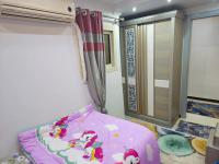 Postel nebo postele na pokoji v ubytování Sidi Beshr Luxury apartment Side Seaview
