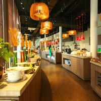 a large kitchen with a person standing in the middle at BobbyJimmy Oceanami Signature Private Villa Resort - 1PN đến 3PN - Tiện Nghi Cao Cấp Chuẩn 5 sao - Bếp riêng - BBQ - Hồ Bơi 2000m2 - Long Hải Vũng Tàu in Long Hai