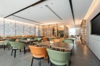 TV a/nebo společenská místnost v ubytování Atour X Hotel Suzhou Xiangcheng Vigorous Island Subway Station