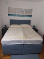 Posteľ alebo postele v izbe v ubytovaní Apartman Meerblick