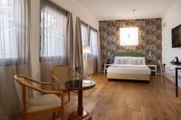 A bed or beds in a room at Hotel Dei Congressi