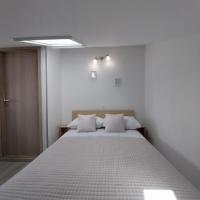Posteľ alebo postele v izbe v ubytovaní Apartments Zlata