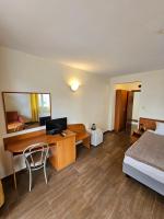 Postel nebo postele na pokoji v ubytování Family Hotel Romantik