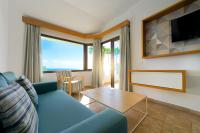A television and/or entertainment centre at Salt Apartments Reina Sol