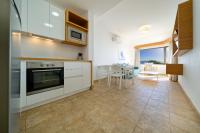 A kitchen or kitchenette at Salt Apartments Reina Sol