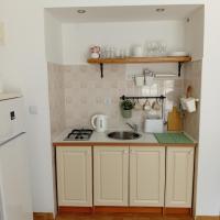 Kuchyň nebo kuchyňský kout v ubytování Apartments Gverić