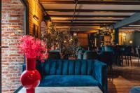 Posezení v ubytování Zur Mühle - Hotel am Fleth